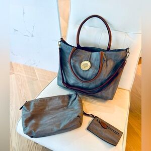 Mulberry (It’s real leather but not real brand)….barely used. Set of 3.